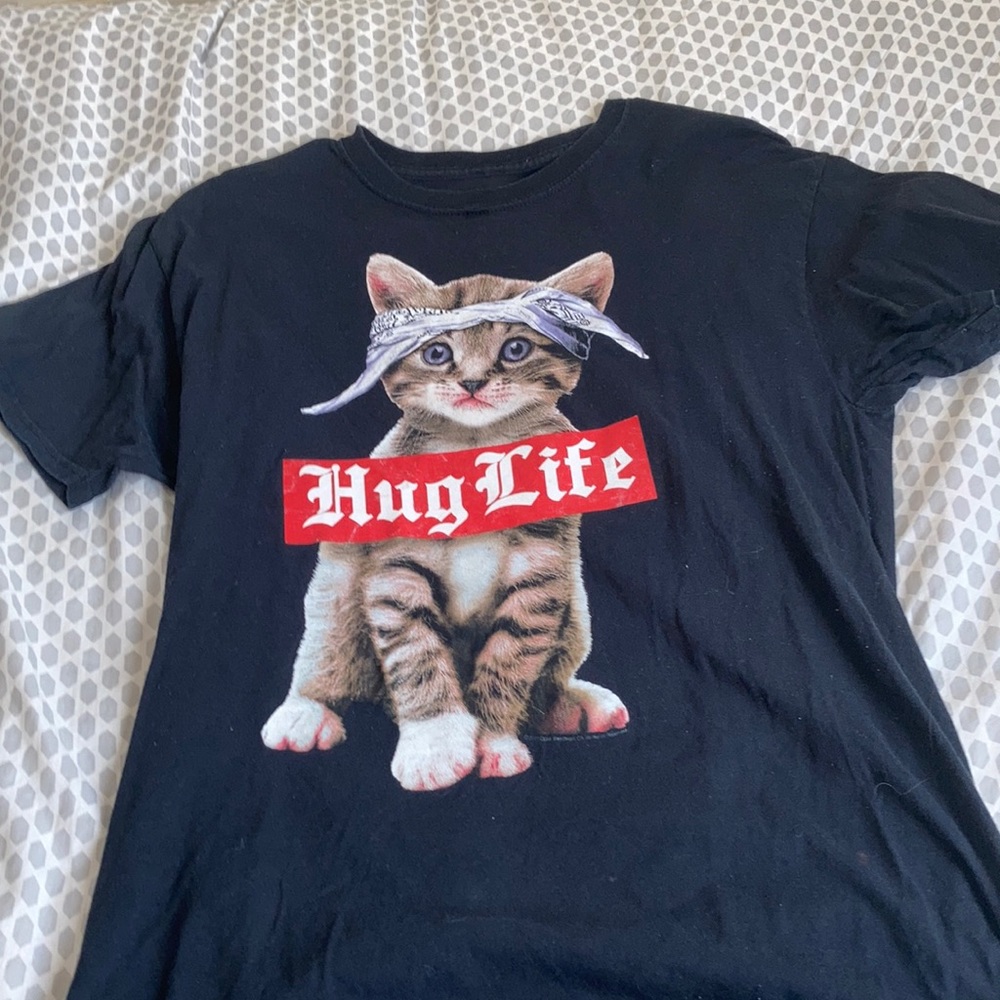 A Hug Life shirt with cat